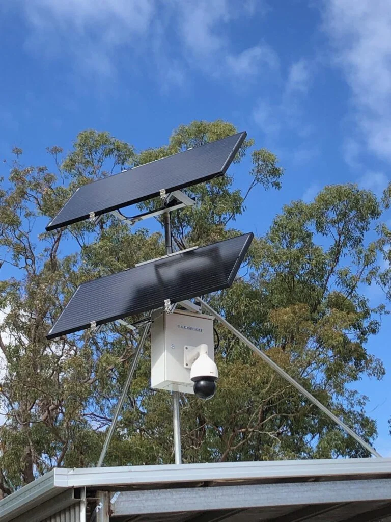 Solar CCTV with dual panels on residential roof